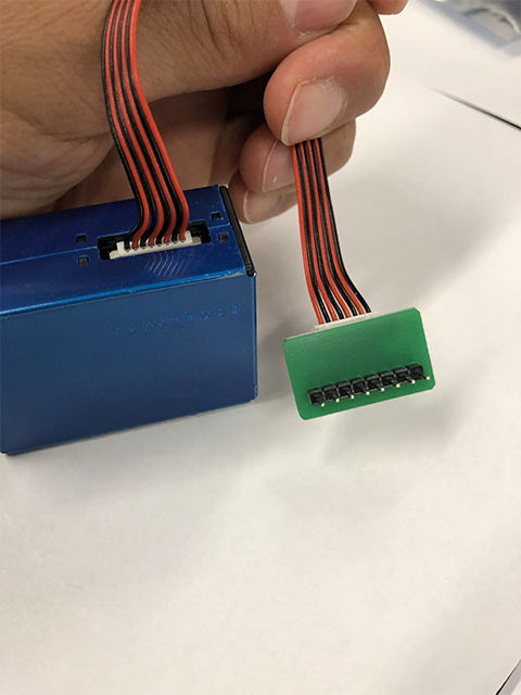 PM Sensor connected via cable with small green board